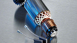 A Bosch Professional motor with copper-colored windings on a metal background.